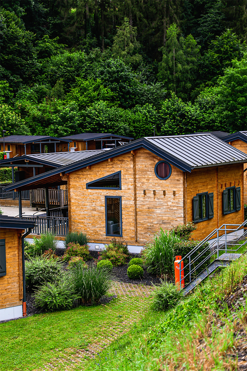 The Ardenne chalets at the edge of the forest at Camping Kaul in Wiltz